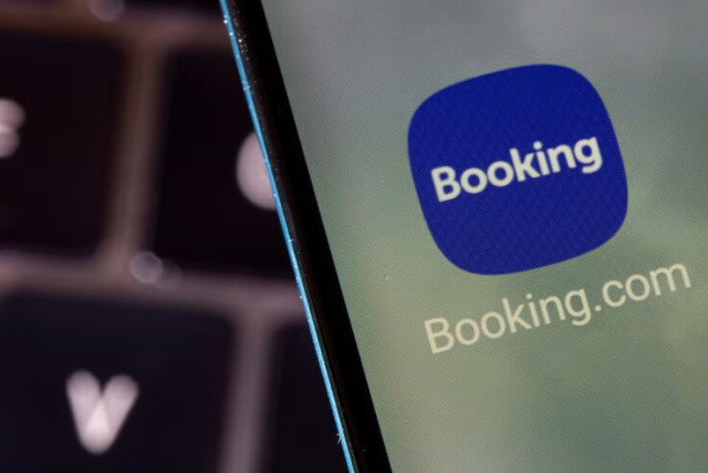 Booking.com app is seen on a smartphone in this illustration taken February 27, 2022